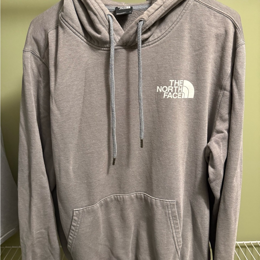 The North Face Gray Pullover Hoodie ‘Never Stop Exploring’